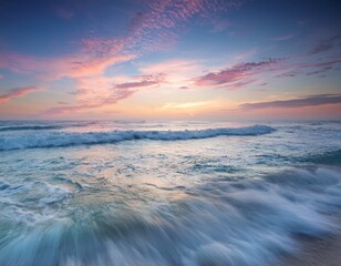 Wall Mural - serene ocean waves at sunrise with gentle pastel sky