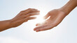 © Bonsales - Caring hands extending, offering emotional support and empathy, symbolizing human connection under luminous sky backdrop