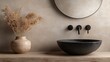 © Lazar - This elegant bathroom image showcases modern fixtures and a natural aesthetic, featuring a beautifully crafted stone basin surrounded by warm, earthy tones and soft decor.