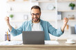 © Prostock-studio - Young Caucasian guy gesturing YES in front of laptop, celebrating success at home office. Millennial man working with portable pc, making great deal, signing online contract, excited over achievement