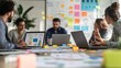 © Abdul - A dynamic workshop scene with a multicultural startup team working on laptops and sketching business ideas, surrounded by charts, sticky notes, and innovation tools. in modern digital art style
