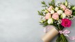 © Sudarat - Beautiful Floral Bouquet with Pink and White Roses on Gray Background
