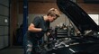 © Vyatcheslav - Female Mechanic Repairing Car Engine in Garage