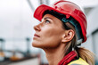 © Emanuel - Shot of a young woman wearing a hardhat at work