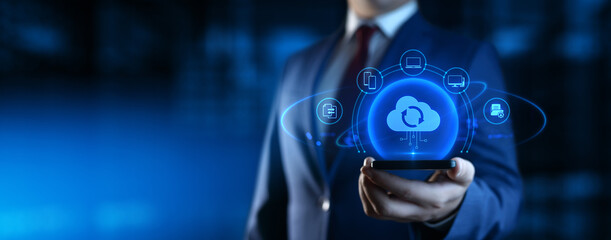Wall Mural - businessman holding smartphone with cloud computing icons on screen. data transfer and cloud backup 