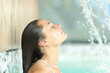 © Antonioguillem - Woman relaxing breathing in spa pool under water jet
