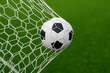 © Passionwith - Football Goal: A Close-Up View of the Net and Soccer Ball | Experience the Thrill of the Game with Dynamic Action Shots of Sports Equipment and Venue | Perfect for Football Fans and Soccer E