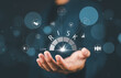 © Nirusmee - Risk Management and Assessment Concept. A man holding digital risk gauge in their hand, with icons represents various aspects of risk management and assessment, indicating different levels of risk.