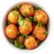 © Pikguru - cod dumpling, salt cod fritters, bunuelos de bacalao. Brazilian snack bolinho de bacalhau isolated on a white background