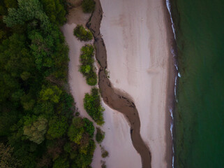 Fototapete - Top view of the beach in Sopot with a river flowing into the sea. Poland