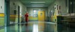 © setiadio - Hospital corridor with a worker