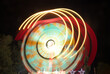 © ADDICTIVE STOCK - Captivating long exposure of colorful amusement park ride