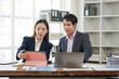 © Kritdanai - Business Professionals Collaborating with Tablet and Laptop
