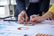 © Kritdanai - Business Team Analyzing Financial Data
