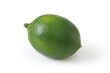 © Zahra - A single, ripe lime rests on a bright white background.