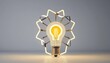 © yassine - Illuminating innovation, bright light bulb on a grey background symbolizing ideas, solutions and inspiration
