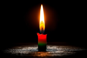 Poster - Colorful candle flickers softly in the dark, creating a warm, inviting atmosphere during a quiet evening