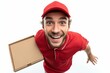 © Yevheniiya - A cheerful delivery man in red uniform, holding a pizza box, expressing his joy and excitement.