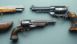 © NAJLA - Antique handguns dark wood grips metal barrels vintage weapons