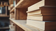 © Jorda - Stack of Books on Wooden Shelves