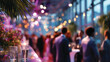 © pilipphoto - Blurred shot of business people at party or corporate event in office center