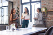 © WavebreakMediaMicro - Sharing awards and smiles, diverse businesswomen celebrating success in modern office