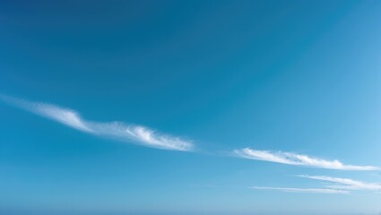 Wall Mural - Outdoor scene showcasing a clear blue sky with light clouds