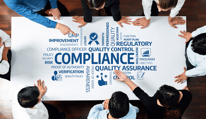Aufkleber - A group of professionals engaged in a compliance meeting, focusing on quality assurance and regulatory standards to improve business processes and ensure effective strategies. Amity