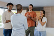 © wavebreak3 - Friends applauding and smiling together at home, celebrating special moment