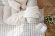 © brizmaker - Cozy white interior with a modern couch and stylish decor