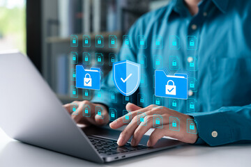 Wall Mural - cybersecurity concept with businessman using a laptop to protect data folders and digital files. rep