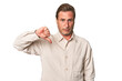 © Asier - A middle-aged man isolated showing a dislike gesture, thumbs down. Disagreement concept.