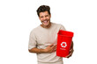 © Asier - Young caucasian man holding a plastic trash isolated laughing and having fun.