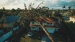 © Sarinya - Aftermath of Hurricane Damage Tree Fallen on House and Crushed Car Aerial View of Destruction in Residential Neighborhood