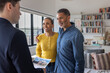 © ReeldealHD images - Couple Celebrating Home Choices with Advisor