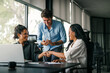 © NDABCREATIVITY - Diverse multiethnic business people, handshake for agreement, b2b deal and cooperation for project