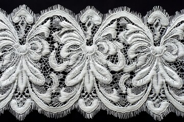 Poster - Detailed white embroidery lace trim displayed on a dark background showcasing intricate designs and craftsmanship