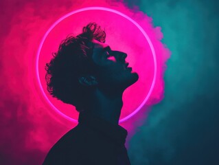 Wall Mural - a silhouette of a person in neon light against a colorful smoky background.