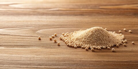 Leinwandbilder - A mound of light beige grain-like substance rests on a wooden surface, surrounded by scattered individual grains.