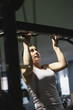 © FotoAndalucia - woman training exercises in gym alone