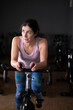 © FotoAndalucia - woman training in spinning room at gym