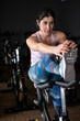 © FotoAndalucia - woman training in spinning room at gym