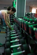 © FotoAndalucia - woman training exercises in gym with weights