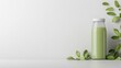 © BirD - Refreshing Green Drink Bottle Mockup with Mint Leaves on White Background bottle drink leaves mint