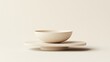 © LuDo - Ceramic dishes and bowls that have been crafted are set against a light background