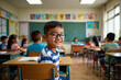 © Rouf - Students and their smiling teacher work in their classroom