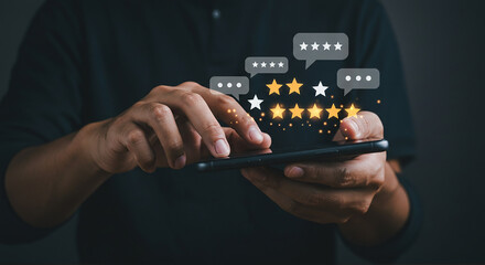 A person interacts with a smartphone displaying star ratings and speech bubbles on a dark background