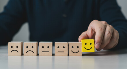 Wall Mural - customer feedback: choosing happiness! hand picking positive smiley block. business, review, survey,
