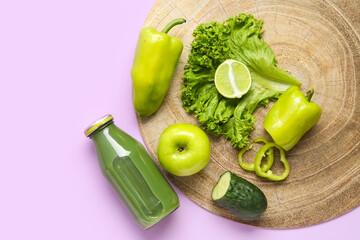 Wall Mural - Bottle of healthy green juice with ingredients on lilac background