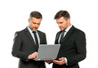 © practice  - Two business people collaborating on a laptop isolated on transparent background